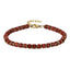 AAB Co stainless steel and hematite beads bracelet with red stone, 14K gold finish