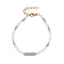AAB Co stainless steel bracelet with natural green aventurine and white shell beads, 14K gold finish