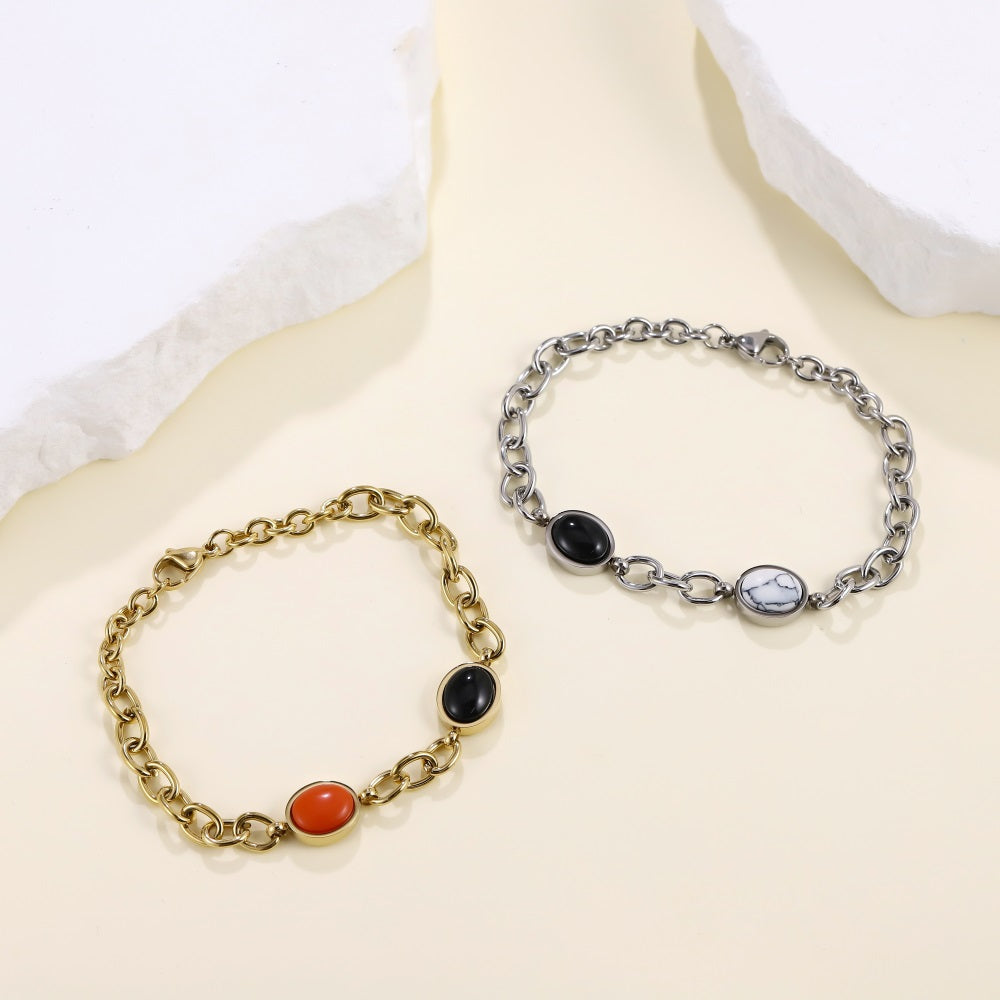 AAB gold-plated stainless steel bracelet with black onyx and synthetic red turquoise, custom jewelry manufacturer