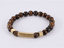 BSS937 STAINLESS STEEL ELASTIC STRING BRACELET WITH NATURAL STONE AAB CO..