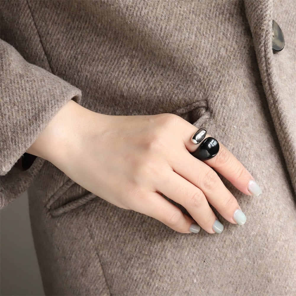 AAB teardrop stainless steel ring in two-tone silver and black finish, contemporary minimalist design, unisex custom jewelry supplier