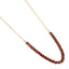 AAB Co stainless steel and hematite beads necklace with red stone, 14K gold finish