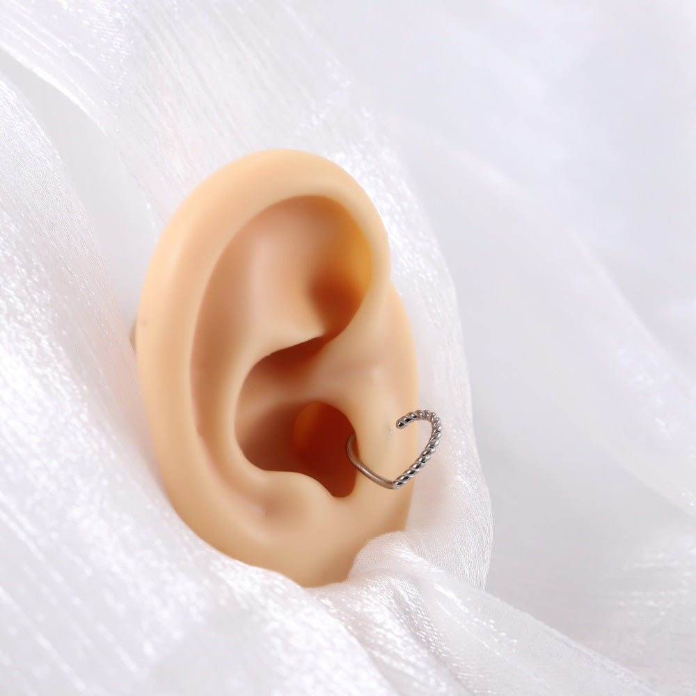 BRN04 STAINLESS STEEL HEART SHAPE NOSE STUD WITH ROPE DESIGN