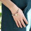 BSS1147 STAINLESS STEEL BRACELET WITH LEAF CHARM AND BEADS