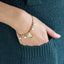 BSS1147 STAINLESS STEEL BRACELET WITH LEAF CHARM AND BEADS