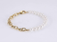 BSS904 STAINLESS STEEL BRACELET WITH SHELL PEARL AAB CO..