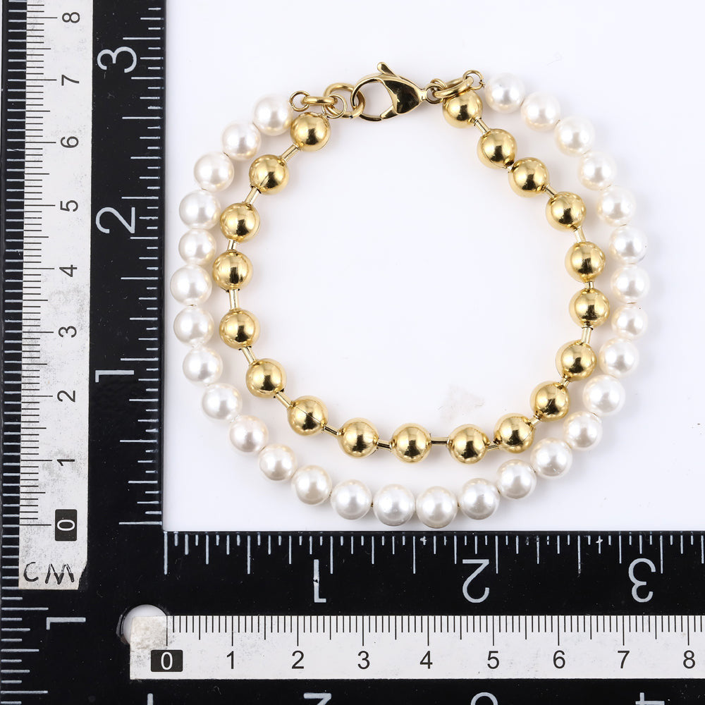 BSS906 STAINLESS STEEL BRACELET WITH SHELL PEARL AAB CO..