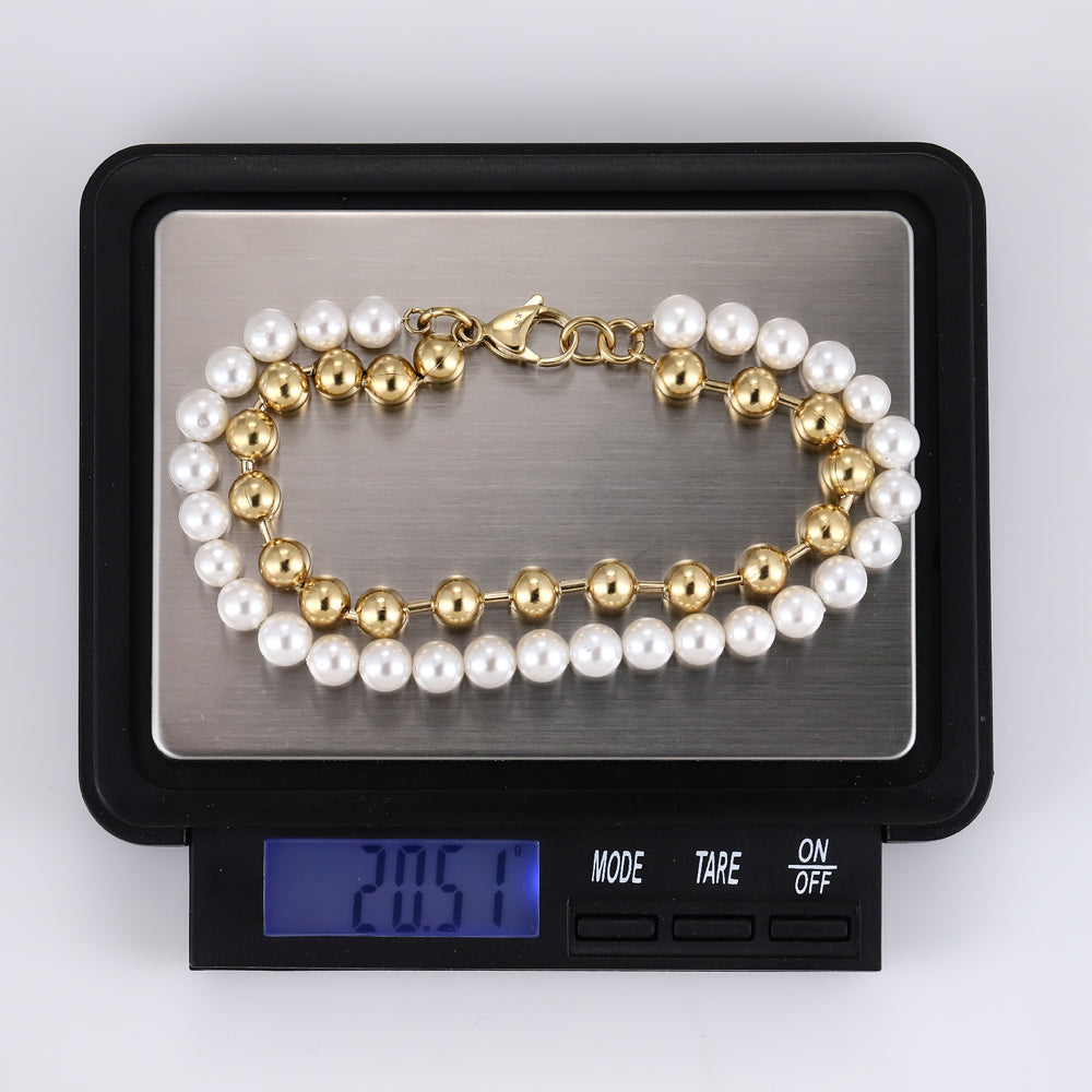 BSS906 STAINLESS STEEL BRACELET WITH SHELL PEARL AAB CO..