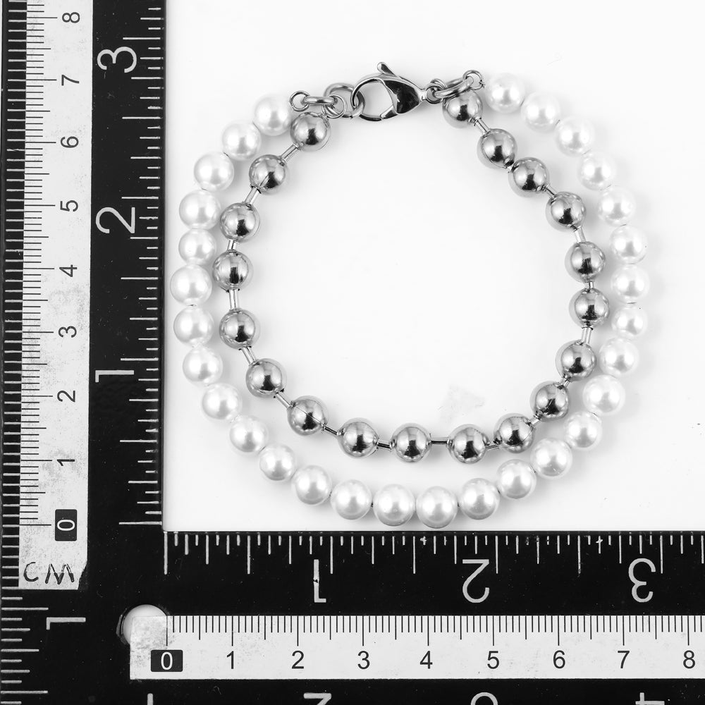 BSS906 STAINLESS STEEL BRACELET WITH SHELL PEARL AAB CO..