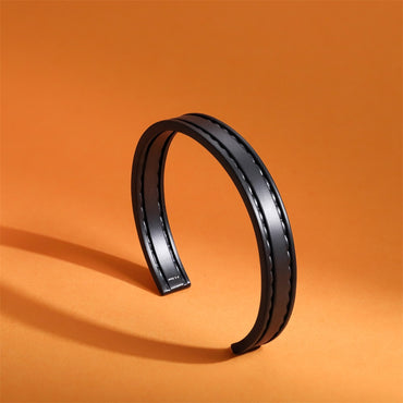 BSSG210 STAINLESS STEEL LEATHER LOOKING OPEN BANGLE