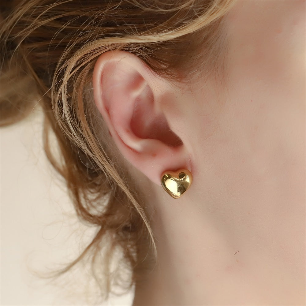ESS845 STAINLESS STEEL HOLLOW HEART EAR STUD