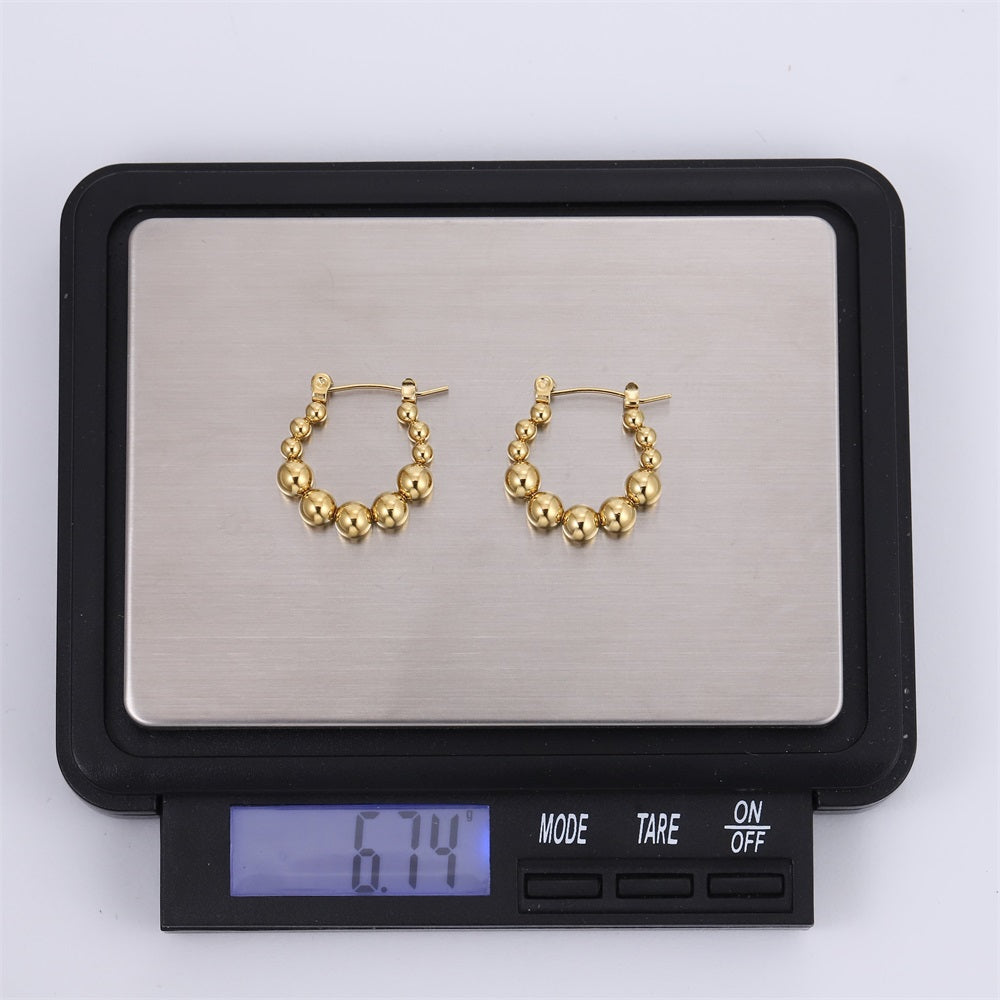 ESS853 STAINLESS STEEL HOOP EARRING WITH ROUND BALLS DESIGN