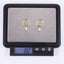 ESS882 STAINLESS STEEL HOOP EARRING WITH ROUND SHELL PEARL