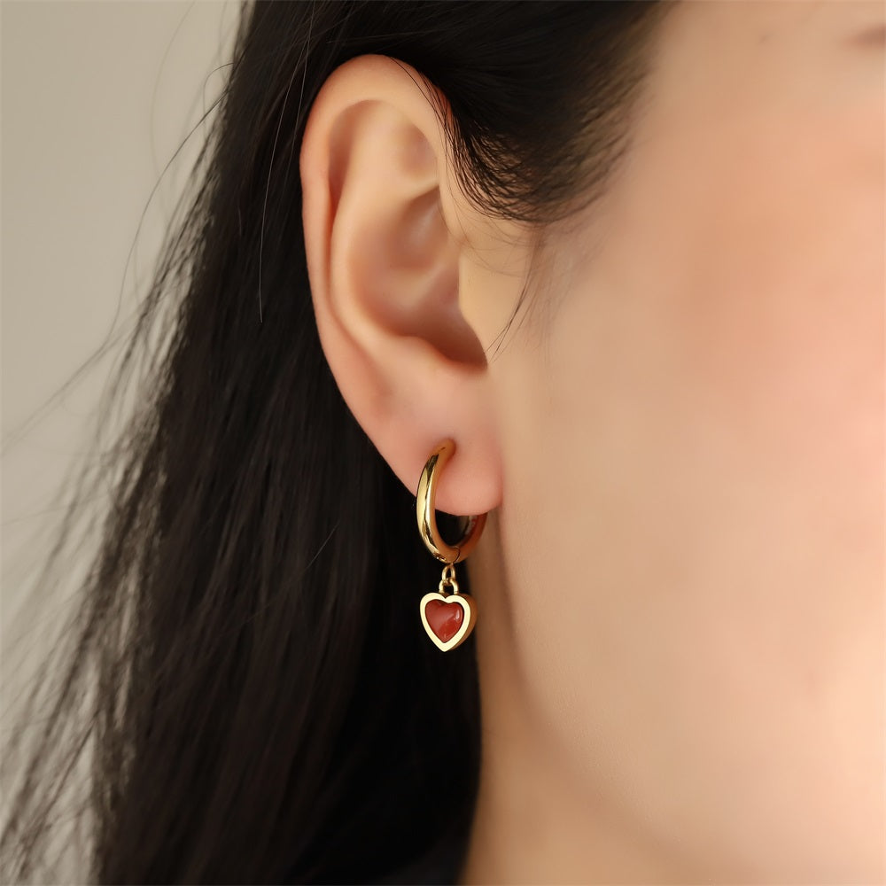 ESS897 STAINLESS STEEL HOOP EARRING WITH HEART CHARM
