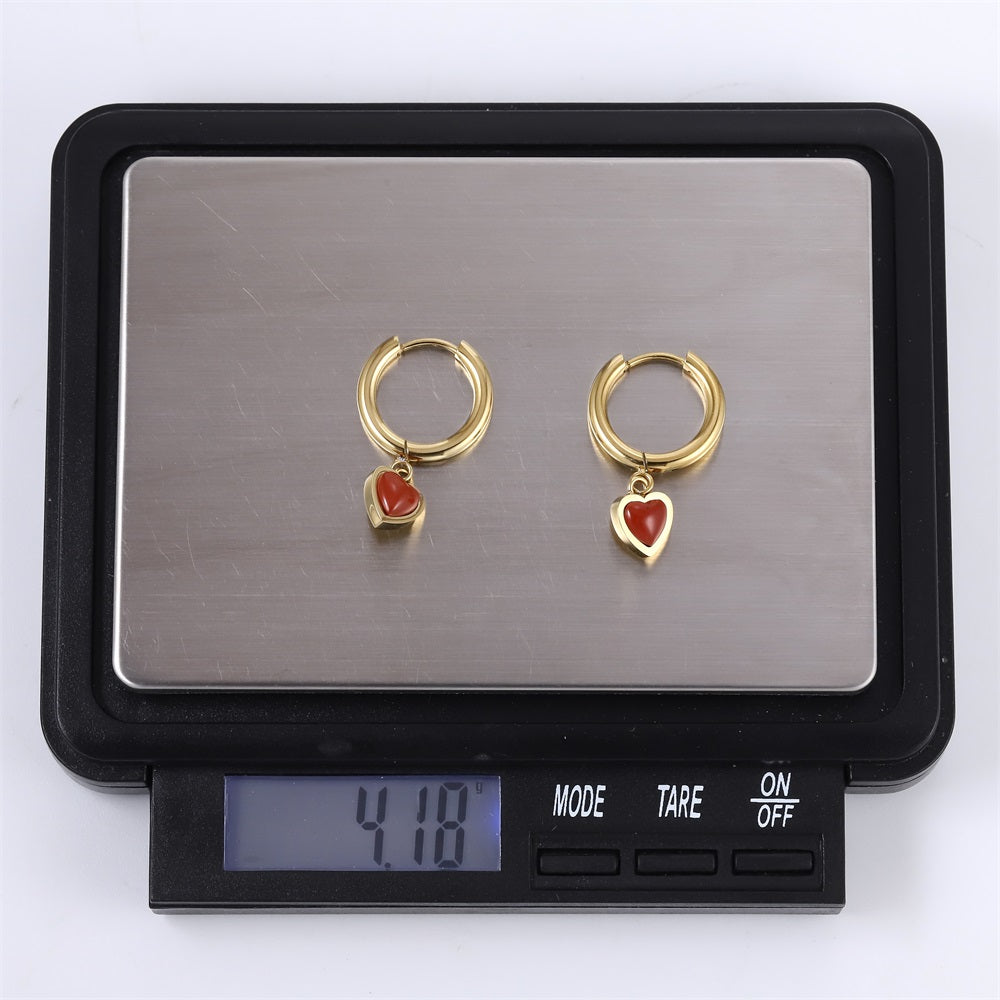 ESS897 STAINLESS STEEL HOOP EARRING WITH HEART CHARM