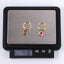 ESS897 STAINLESS STEEL HOOP EARRING WITH HEART CHARM