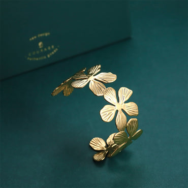MBSG21 STAINLESS STEEL FLOWER SHAPE ADJUSTABLE OPEN BANGLE