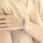 MBSG46 STAINLESS STEEL OPEN BANGLE WITH FLOWER DESIGN
