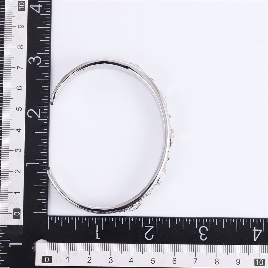 MBSG46 STAINLESS STEEL OPEN BANGLE WITH FLOWER DESIGN