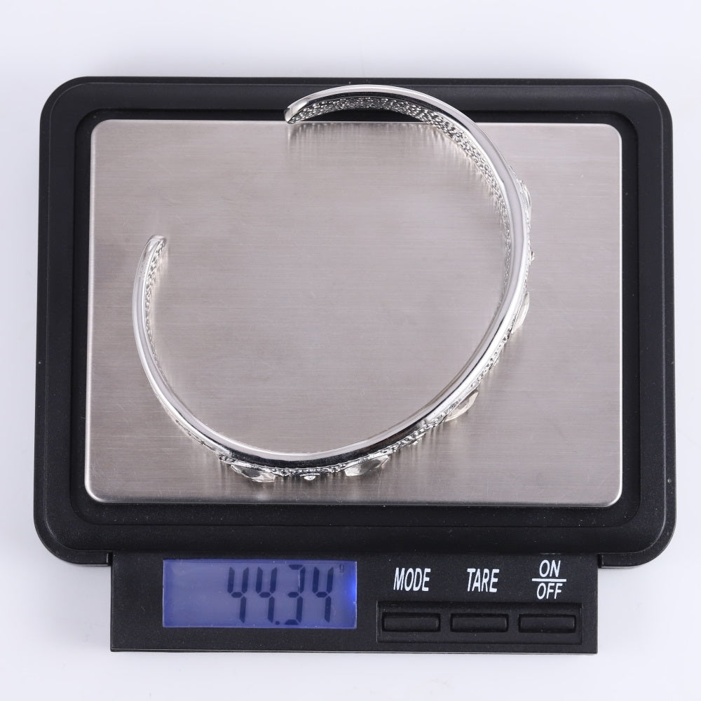 MBSG46 STAINLESS STEEL OPEN BANGLE WITH FLOWER DESIGN