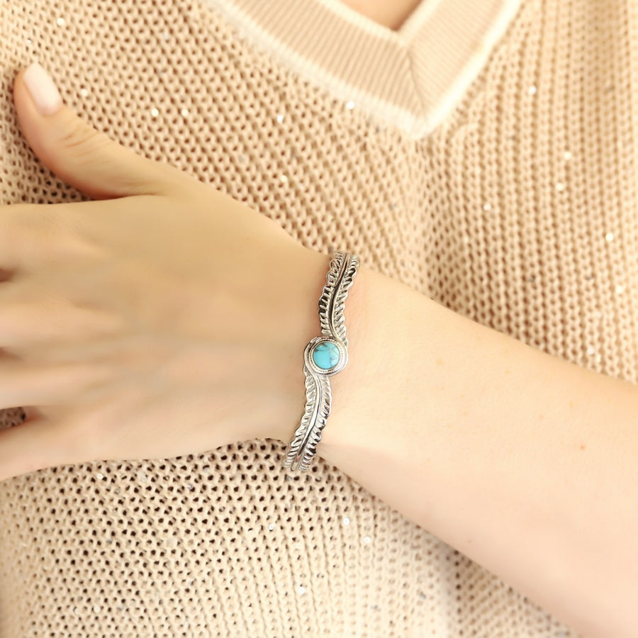 MBSG50 STAINLESS STEEL FEATHER OPEN BANGLE WITH SYNTHETIC TURQUOIZE