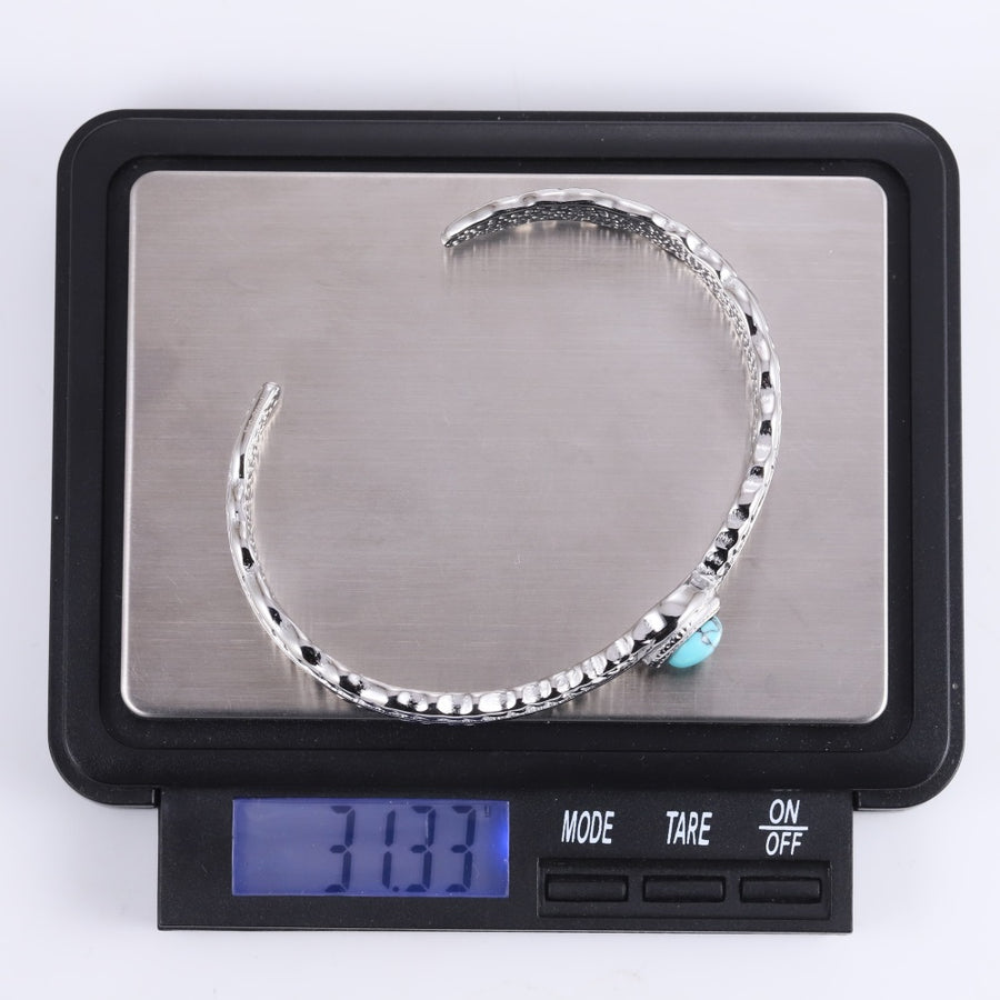 MBSG50 STAINLESS STEEL FEATHER OPEN BANGLE WITH SYNTHETIC TURQUOIZE