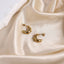 MESS69 STAINLESS STEEL CROISSANT STUD EARRING