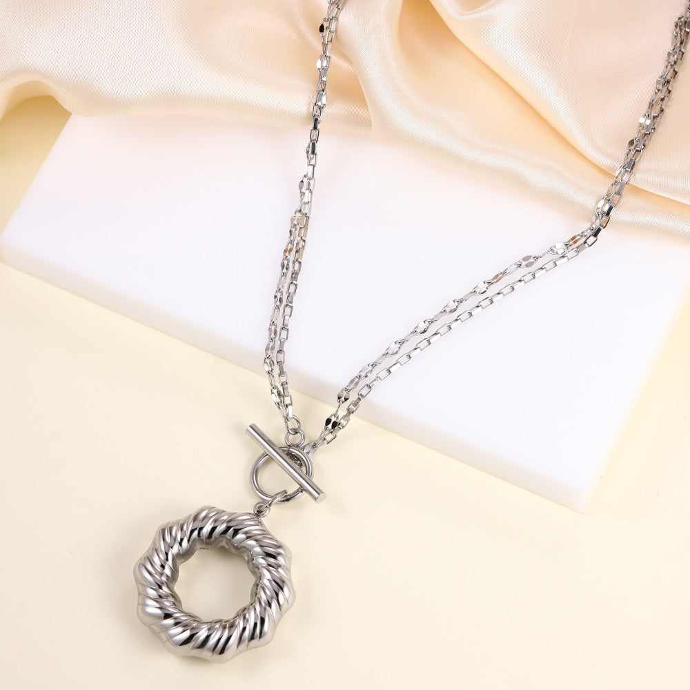 MNSS54 STAINLESS STEEL T-BAR NECKLACE WITH TWISTED ROUND HOLLOW CHARM