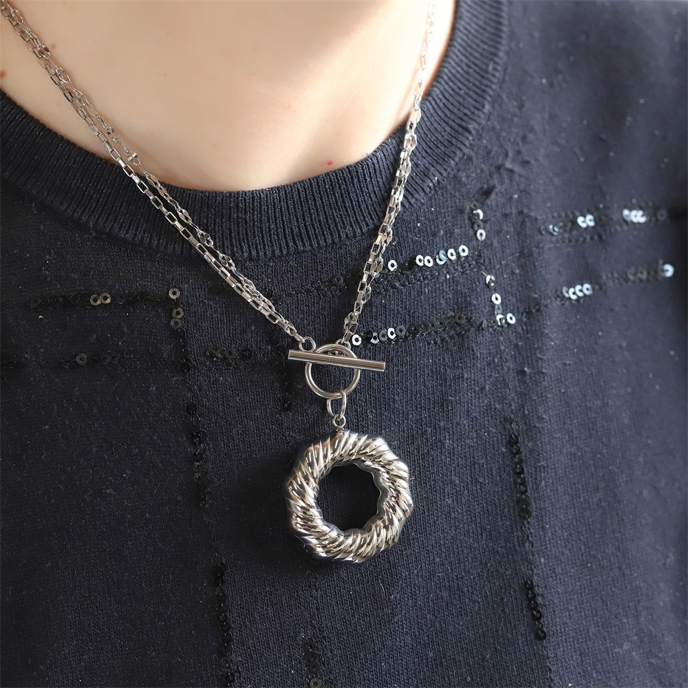 MNSS54 STAINLESS STEEL T-BAR NECKLACE WITH TWISTED ROUND HOLLOW CHARM