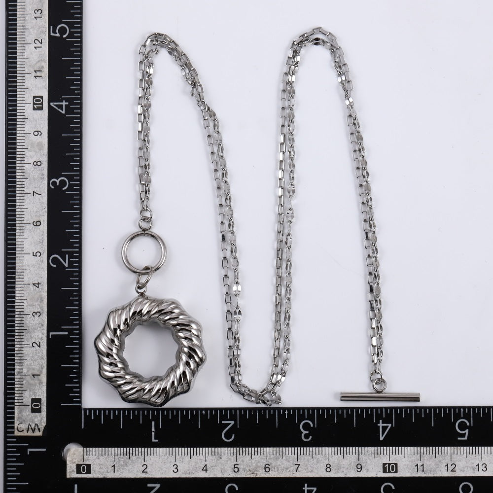 MNSS54 STAINLESS STEEL T-BAR NECKLACE WITH TWISTED ROUND HOLLOW CHARM