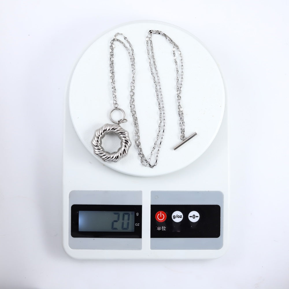 MNSS54 STAINLESS STEEL T-BAR NECKLACE WITH TWISTED ROUND HOLLOW CHARM