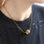 MNSS57 STAINLESS STEEL NECKLACE WITH HOLLOW BALL PENDANT AND ROUND SNAKE CHAIN