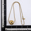 MNSS57 STAINLESS STEEL NECKLACE WITH HOLLOW BALL PENDANT AND ROUND SNAKE CHAIN