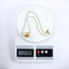 MNSS57 STAINLESS STEEL NECKLACE WITH HOLLOW BALL PENDANT AND ROUND SNAKE CHAIN