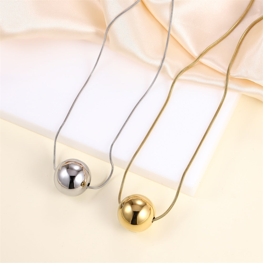 MNSS57 STAINLESS STEEL NECKLACE WITH HOLLOW BALL PENDANT AND ROUND SNAKE CHAIN