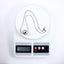 MNSS57 STAINLESS STEEL NECKLACE WITH HOLLOW BALL PENDANT AND ROUND SNAKE CHAIN