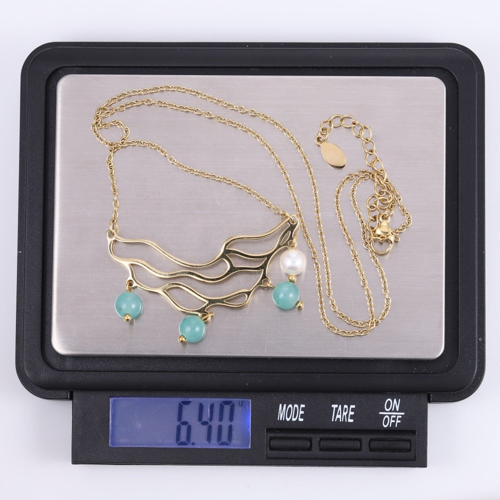 NSS1077 STAINLESS STEEL NECKLACE WITH WAVE PATTERN AND BEADS