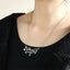 NSS1077 STAINLESS STEEL NECKLACE WITH WAVE PATTERN AND BEADS