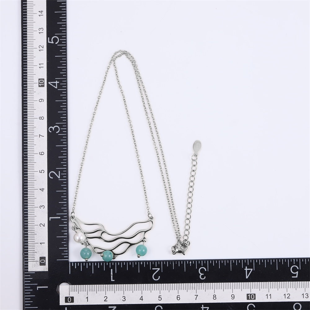 NSS1077 STAINLESS STEEL NECKLACE WITH WAVE PATTERN AND BEADS