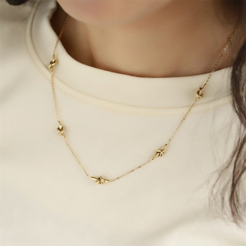 NSS1103 STAINLESS STEEL NECKLACE WITH KNOT DESIGN