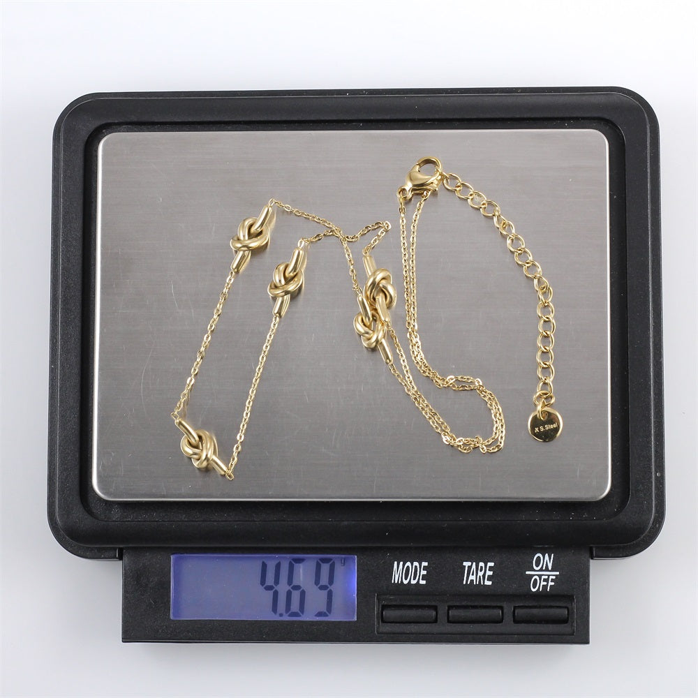 NSS1103 STAINLESS STEEL NECKLACE WITH KNOT DESIGN