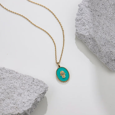 PSS1234 STAINLESS STEEL OVAL PENDANT WITH HAMSA DESIGN AAB CO..