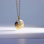 PSS1267 STAINLESS STEEL ROUND PENDANT WITH CZ AAB CO..