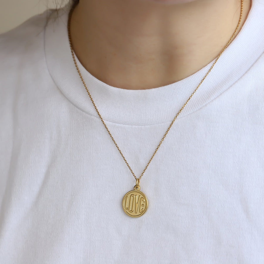 PSS1378 STAINLESS STEEL ROUND PENDANT WITH "LOVE"