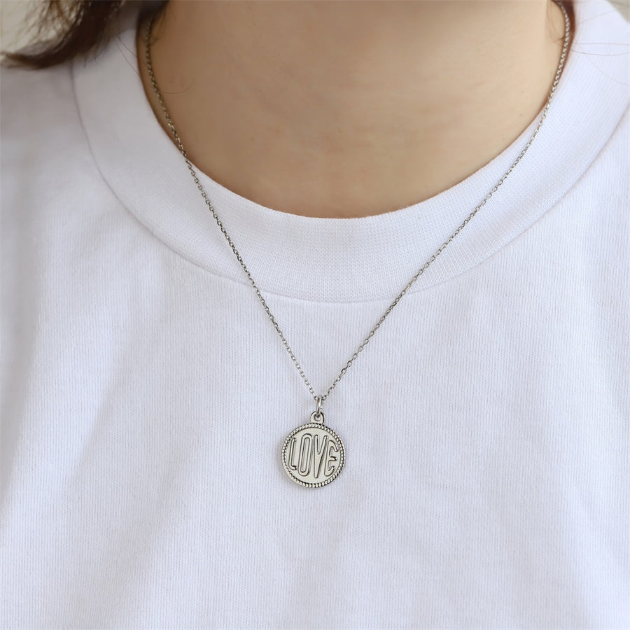 PSS1378 STAINLESS STEEL ROUND PENDANT WITH "LOVE"