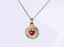 PSS1394 STAINLESS STEEL ROUND PENDANT WITH HEART NATURAL RED STONE