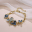 TBS151 BASE METAL FLOWER LINK BRACELET