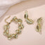 TES129 BASE METAL DOUBLE-LEAF DROP EARRING