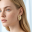 TES72 BASE METAL FLORAL EARRING WITH STONE