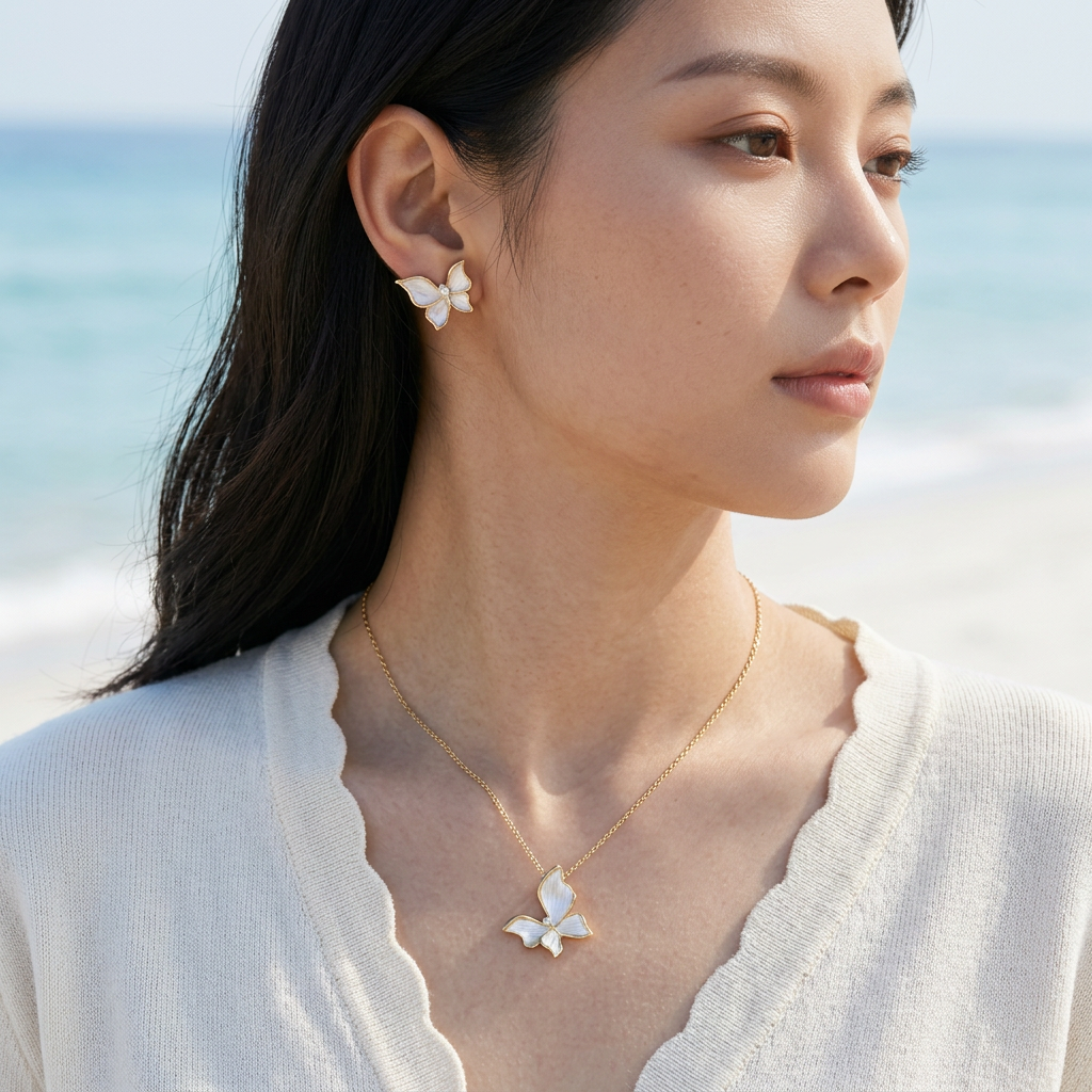 TES140 BASE METAL BUTTERFLY EARRING